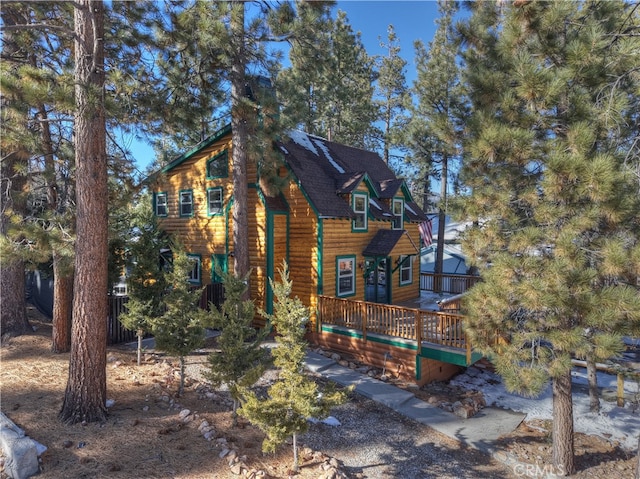 view of front of property with a deck