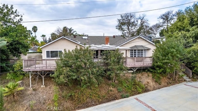 view of front of house featuring a deck