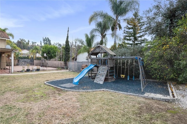 view of jungle gym with a lawn