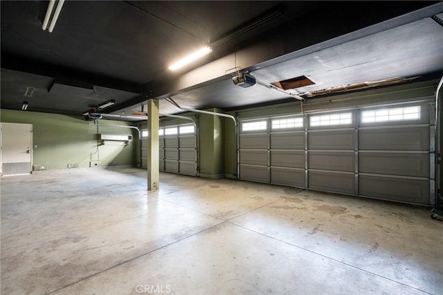 garage featuring a garage door opener