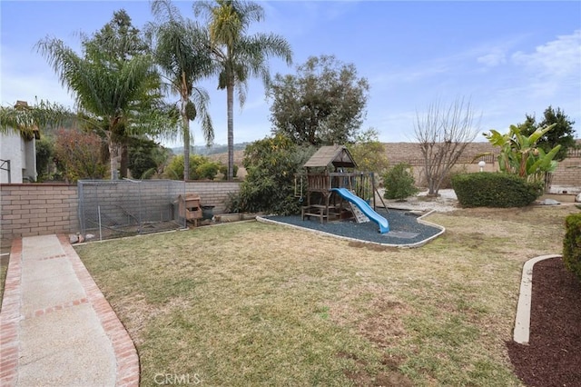 view of playground featuring a yard