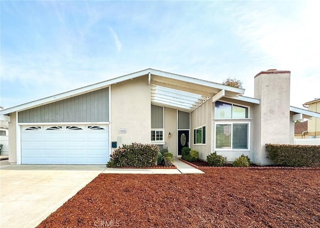 ranch-style home featuring a garage