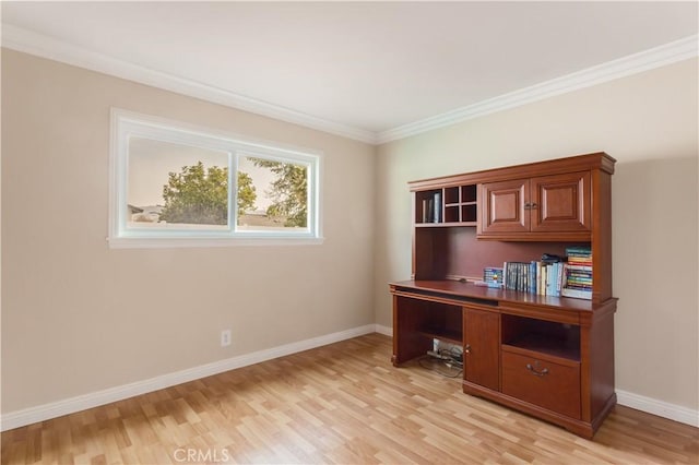 unfurnished office featuring crown molding and light wood-type flooring