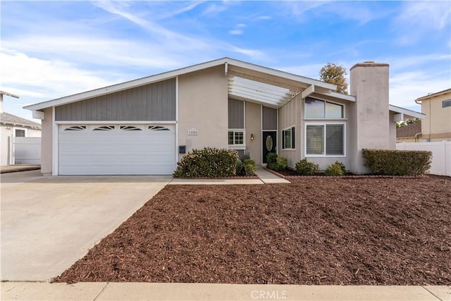 ranch-style home with a garage