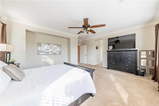 bedroom featuring crown molding, light carpet, and ceiling fan