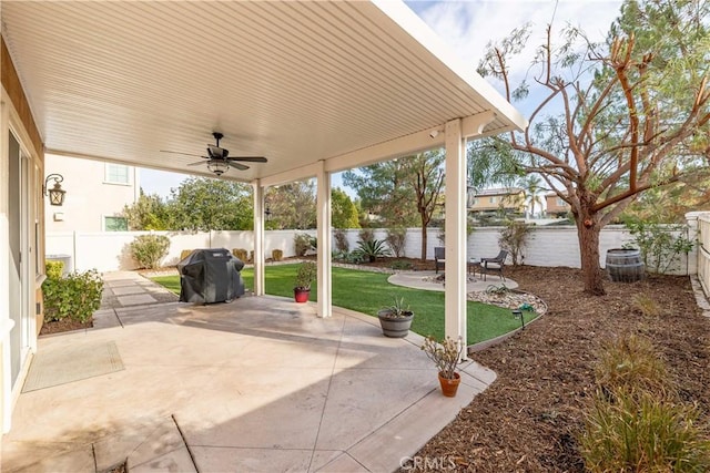 view of patio / terrace with area for grilling and ceiling fan