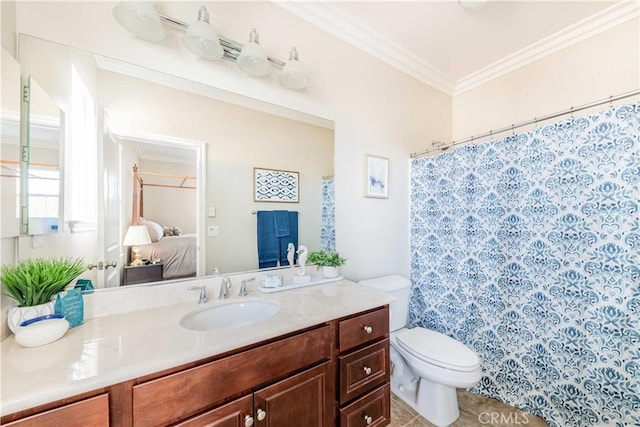 bathroom with ornamental molding, toilet, tile patterned flooring, and vanity