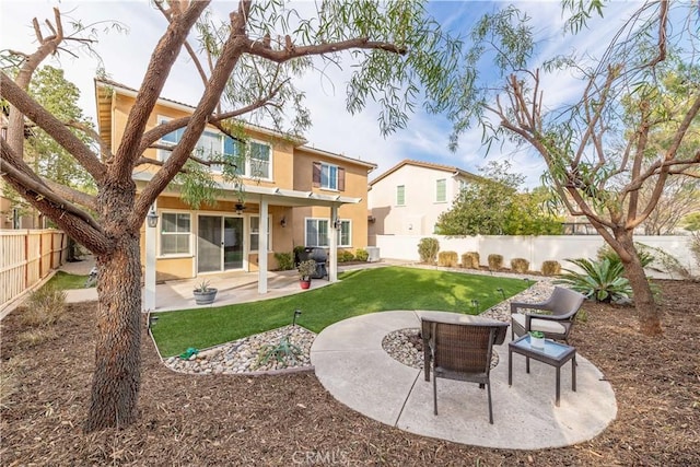 rear view of house with a patio area