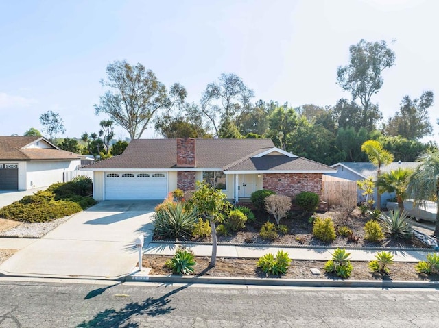 single story home featuring a garage