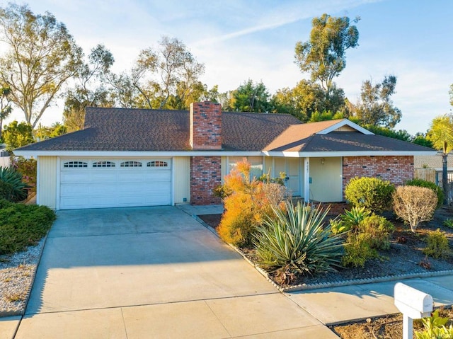 ranch-style home featuring a garage