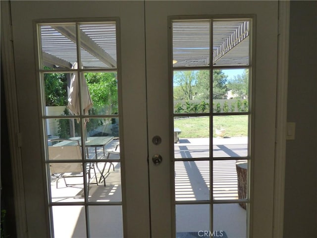 doorway featuring french doors