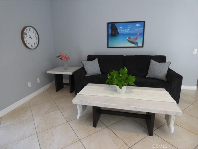 living room featuring light tile patterned floors