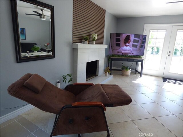 tiled living room with a tiled fireplace