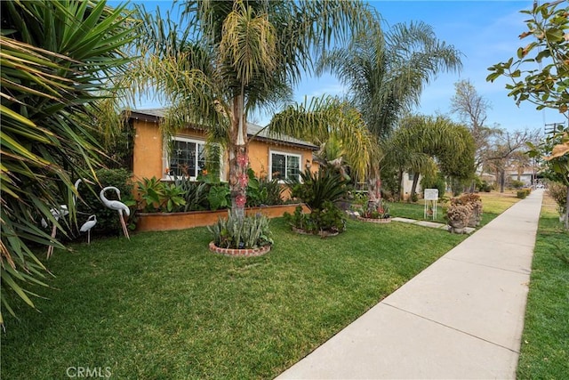 exterior space featuring a front yard