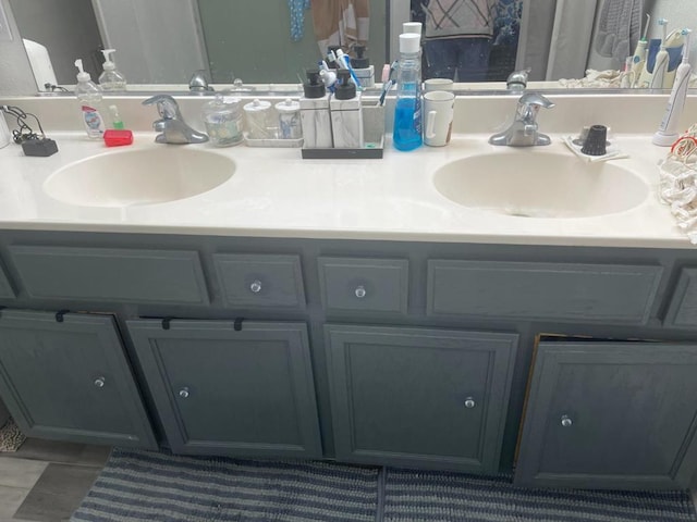 bathroom featuring vanity and tile patterned flooring