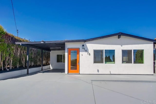 view of front of house featuring a carport