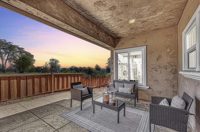 patio terrace at dusk with outdoor lounge area