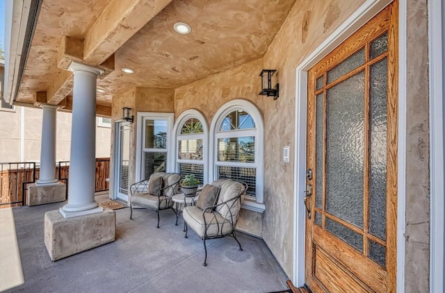 view of patio featuring a porch