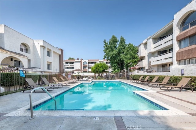 view of swimming pool featuring a patio