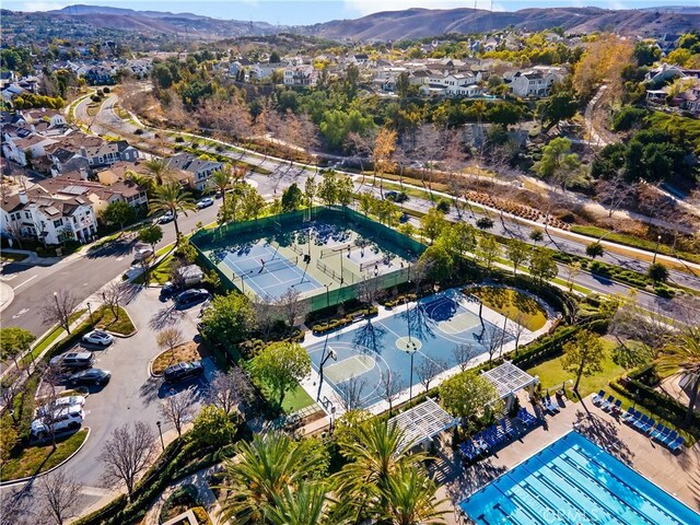 birds eye view of property featuring a mountain view