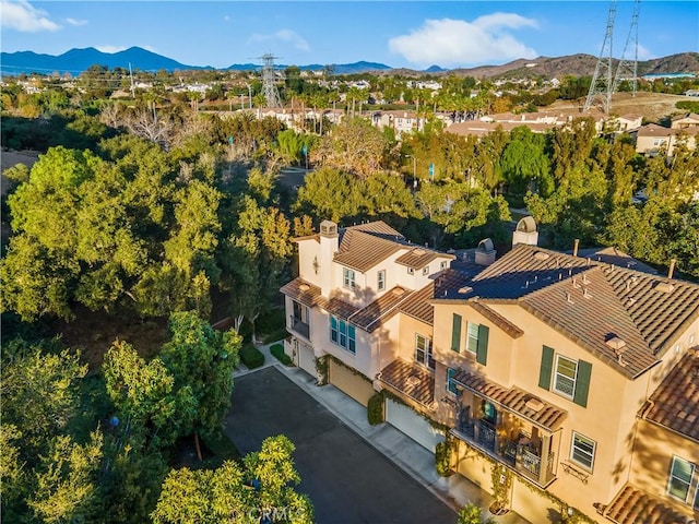 bird's eye view with a mountain view