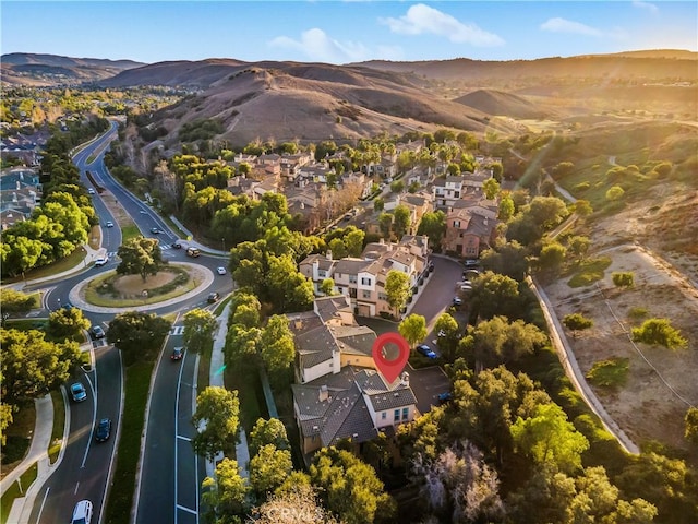 bird's eye view with a mountain view