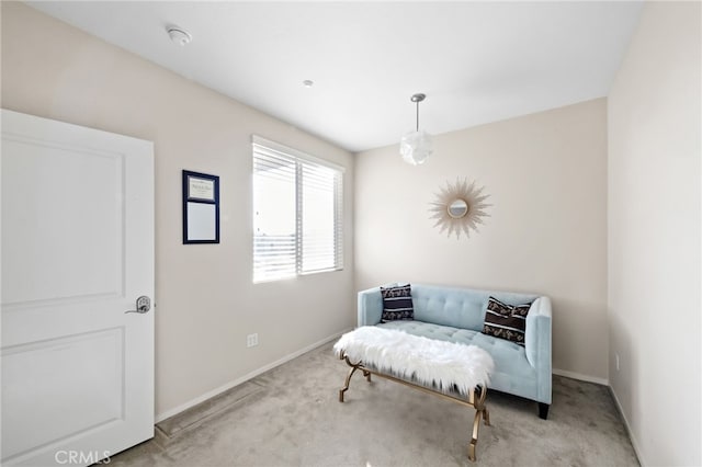 sitting room with light colored carpet