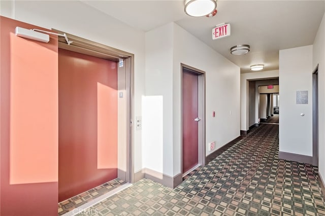 corridor featuring elevator