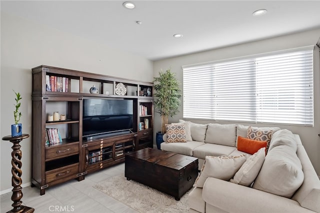 living room featuring light tile patterned flooring