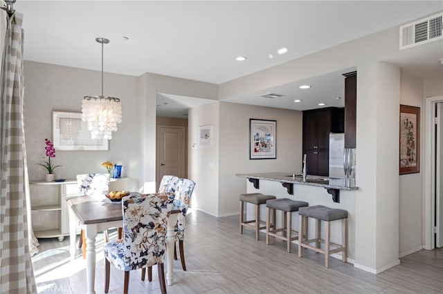 dining area featuring sink