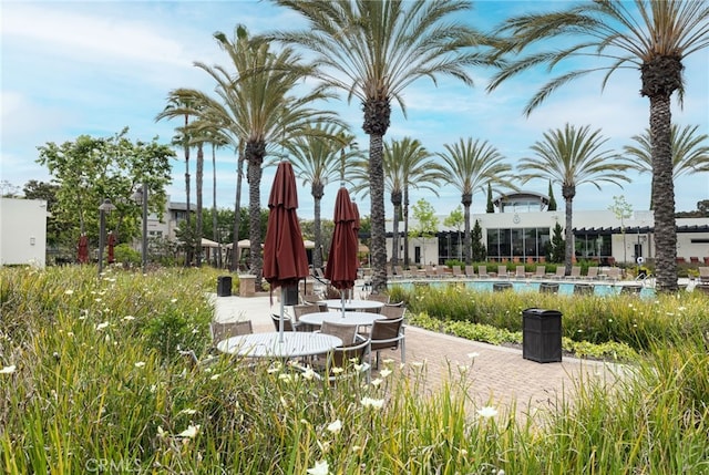 view of patio featuring a community pool