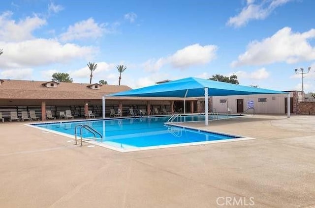 view of pool with a patio area