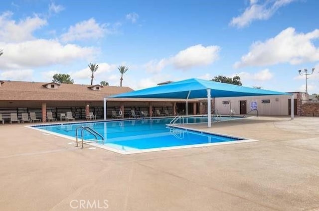 29460 Thornhill, Menifee, CA 92586 - pool featuring a patio and fence