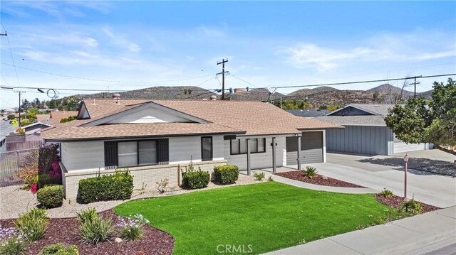 29460 Thornhill, Menifee, CA 92586 - ranch-style house featuring a garage, fence, a front lawn, a shingled roof, and concrete driveway