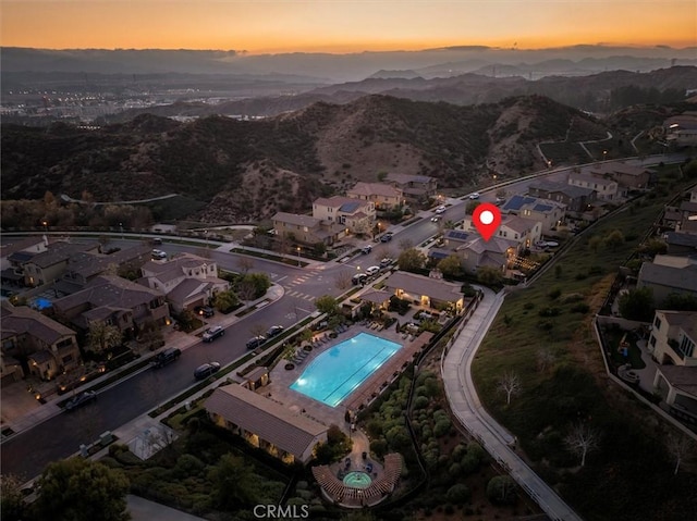 aerial view at dusk with a mountain view