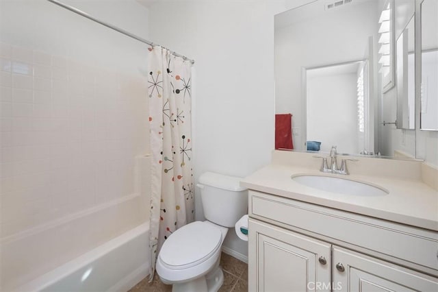 full bathroom featuring vanity, shower / tub combo with curtain, and toilet