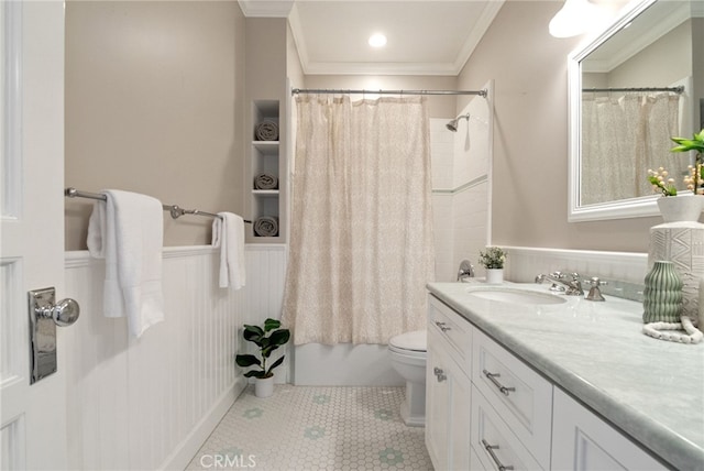 full bathroom featuring tile patterned flooring, vanity, shower / bath combo, toilet, and crown molding