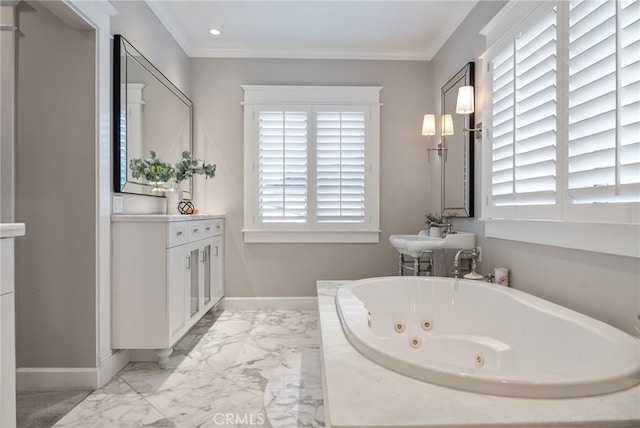 bathroom with ornamental molding and a bath