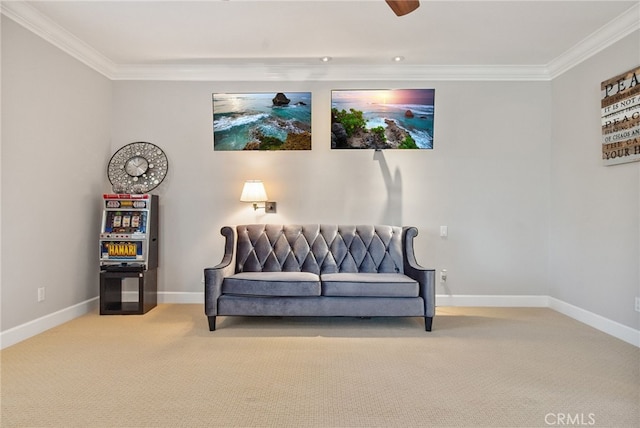 living area with crown molding and light colored carpet