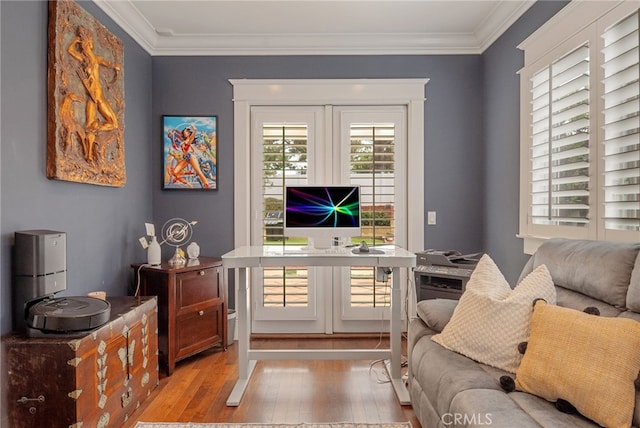 interior space with crown molding and light wood-type flooring