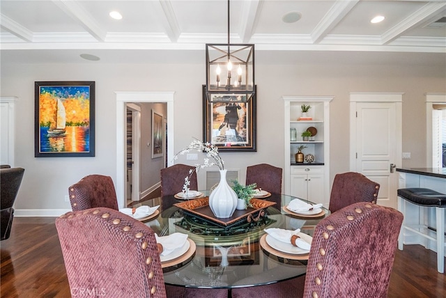 dining area featuring ornamental molding, dark wood-type flooring, and beam ceiling