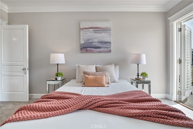 bedroom with crown molding, access to outside, and carpet flooring