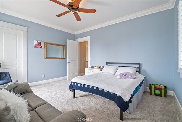 carpeted bedroom featuring crown molding and ceiling fan