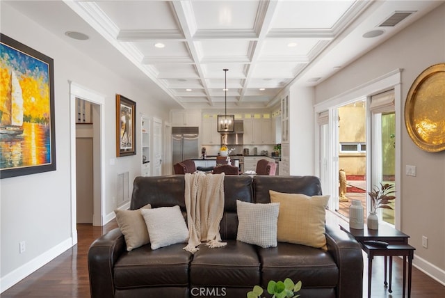 living room with dark hardwood / wood-style floors, coffered ceiling, beam ceiling, and crown molding