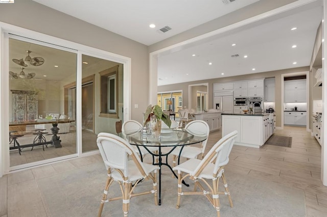 dining area featuring light hardwood / wood-style floors