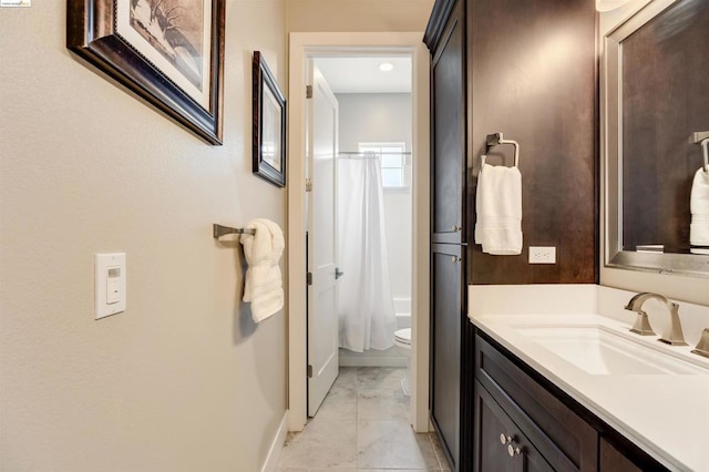 full bathroom with vanity, shower / bath combination with curtain, and toilet