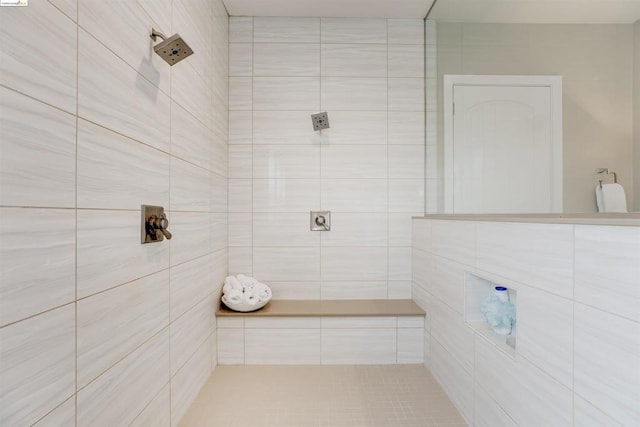 bathroom with tiled shower