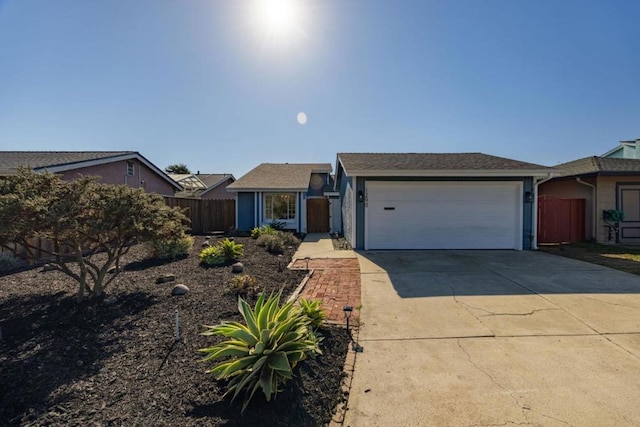 ranch-style house featuring a garage