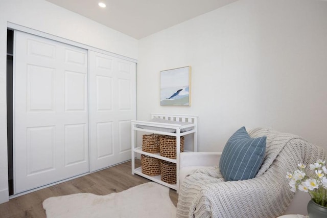 sitting room featuring light hardwood / wood-style flooring