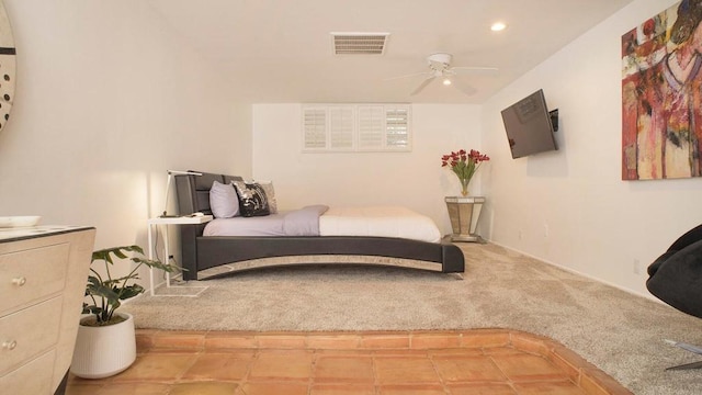 carpeted bedroom featuring ceiling fan